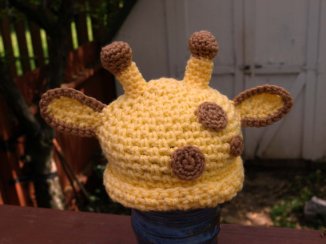 Look at how cute this giraffe hat is! She also does elephants, koala's, all sorts of creative stuff. 